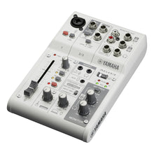 Load image into Gallery viewer, Yamaha A063 8-channel digital audio mixer in light gray with black and silver controls, shown at an angle on a white background.