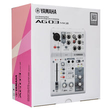 Load image into Gallery viewer, Yamaha AG03 MK2 Live Streaming Mixer retail packaging box, featuring a white front with a pink side panel and a printed product photo of the mixer console.