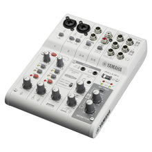 Load image into Gallery viewer, Yamaha MG14X16 digital audio mixer in white with gray controls, shown at an angle on a white background.