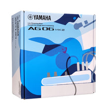 Load image into Gallery viewer, Yamaha AG06 MK2 Live Streaming Mixer retail packaging box, featuring a blue and white abstract graphic design with the Yamaha logo and product name.