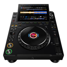 Load image into Gallery viewer, Birds eye view of AlphaTheta Pioneer CDJ-3000X professional DJ media player, showing large 9-inch touchscreen display with waveforms, jog wheel, cue and play buttons, and full performance controls for club DJs