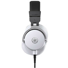 Load image into Gallery viewer, Yamaha over-ear wired headphones in silver and black, shown from the side on a plain white background.