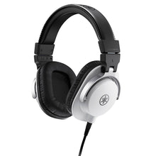 Load image into Gallery viewer, Yamaha over-ear wired headphones in silver and black, shown from a side profile view on a solid white background.