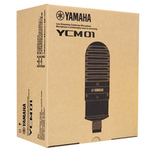 Load image into Gallery viewer, Yamaha YCM01 live streaming condenser microphone retail box in brown kraft paper packaging, featuring a black microphone graphic and Yamaha branding.